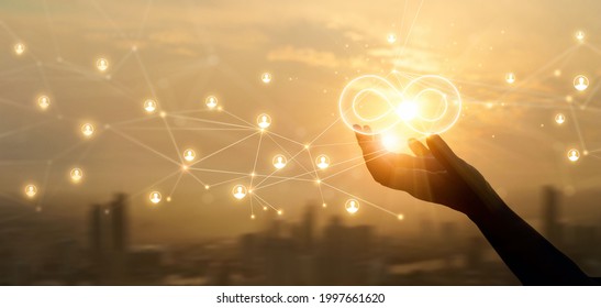 Hands holding sign of infinity on global customer network connection. Digital marketing and unlimited market on  networking. 