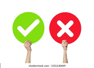 Hands Holding Signboard Green Check Mark And Red X Mark Or True And False Signs Isolated On White Background.