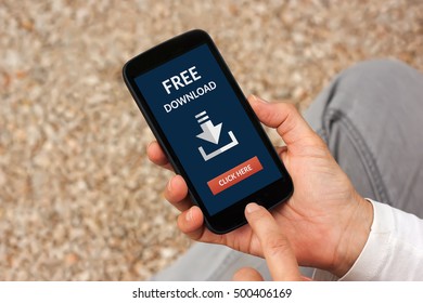 Hands Holding Smart Phone With Free Download Concept On Screen. All Screen Content Is Designed By Me