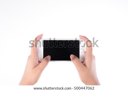 hands holding smart phone, playing games