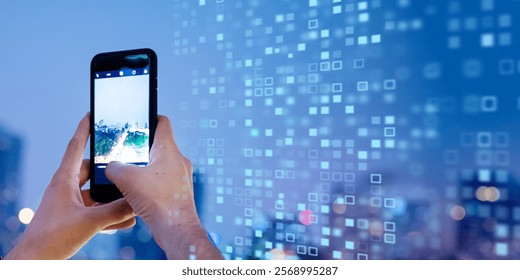 Hands holding a smartphone capturing a cityscape. Digital overlay with blue squares. Smartphone photography and digital technology concept. Technology and everyday lifestyle. - Powered by Shutterstock