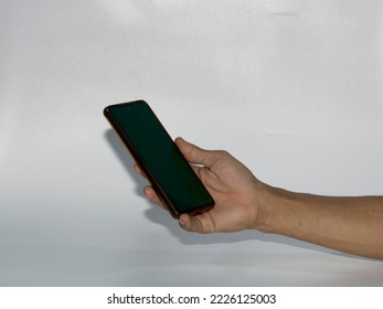 Hands holding smartphone, Copyspace for ad. White background - Powered by Shutterstock