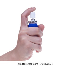 Hands holding a spray object .  