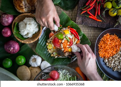 Hands Holding Sticky Rice To Eat With Thai Papaya Salad Or What We Call 