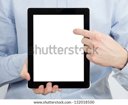 hands holding the tablet computer