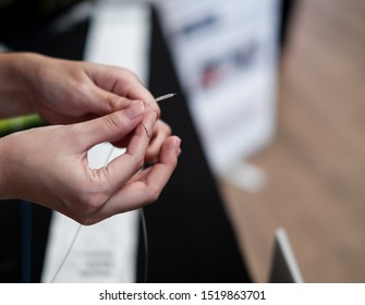 Hands Holding A Tiny Balloon Catheter For Percutaneous Coronary Intervention (pci)