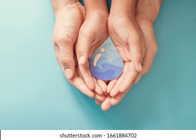 Hands Holding Water Drop,world Water Day,clean Water And Sanitation, Hand Sanitizer And Hygiene For Covid Pandemic, Vaccine,family Washing Hands, CSR, Save Water, Clean Renewable Energy Concept 