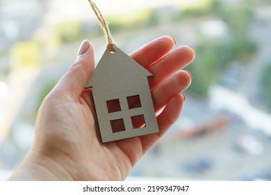 Hands Holding Wooden House, Family Home, Homeless Shelter And Real Estate, Housing And Mortgage Crisis, Foster Home, Family Kindergarten, Social Distancing