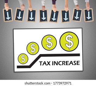 Hands Holding Writing Slates With Arrows Pointing On Tax Increase Concept