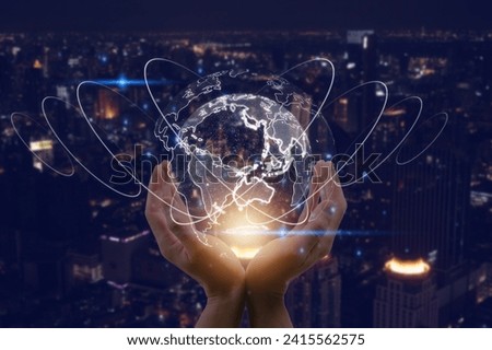 hands holsing virtual glob and blurred city background in concept of ai technology digital transformation internet network techonlogy