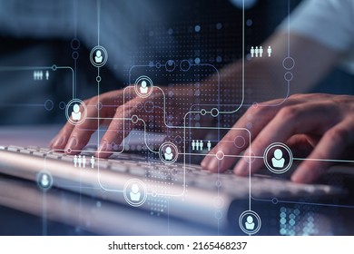 Hands of hr specialist is typing the keyboard in the internet to find the best candidates to create international network in recruitment process. Concept of success. Social media hologram icons. - Powered by Shutterstock