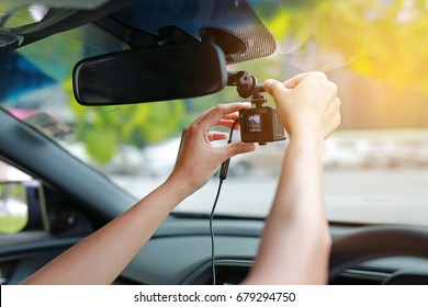 Hands installation front camera car recorder, Car DVR Vehicle. - Shutterstock ID 679294750