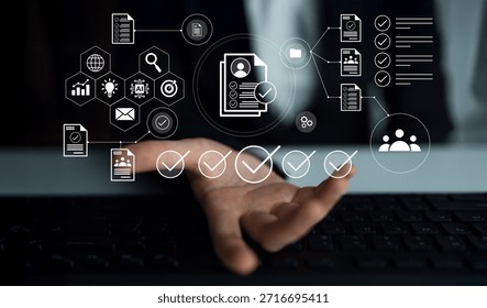 Hands interacting with a digital interface displaying data management concepts, illustrating modern technology effects on business workflows and productivity solutions. Gantry