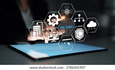 Hands Interacting with Digital Interface Showcasing No Code Development Tools, Artificial Intelligence, and Database Management Concepts Quark.
