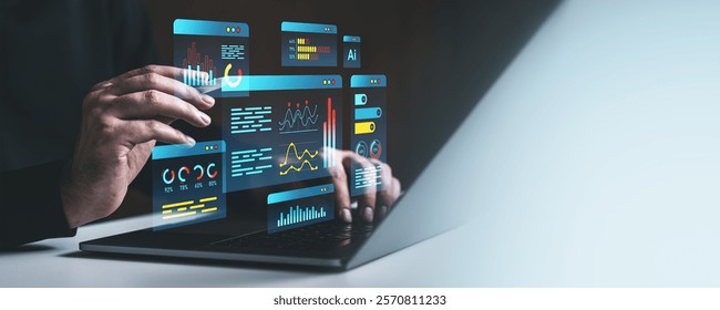 Hands interacting with futuristic holographic data analytics interface, glowing graphics over laptop, concept of technology and AI - Powered by Shutterstock - Get 15% off with code: PIKWIZARD15