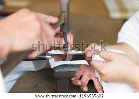 Similar – Caregiver checking blood pressure to a senior woman