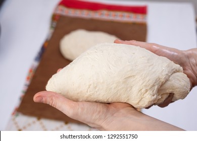 Hands Kneading A Bread Pie Dough Close Up On. Women To Mold The Dough. A Dough Will Rise Before Baking In Oven