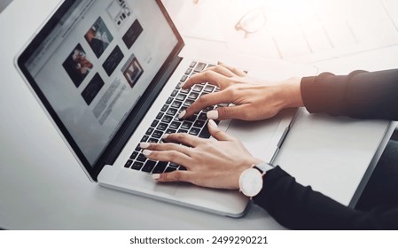 Hands, laptop and typing at desk for remote work, research and magazine editing. Woman, writer and computer screen in home office for article, news update and language translation for information