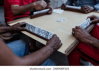 hands of latin people playing dominoes in Old Havana Cuba, Caribbean black people - Powered by Shutterstock