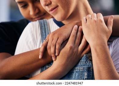 Hands, love and lgbt with a woman couple hugging outdoor for romance, dating or non binary affection. Hug, date and gay with a gender neutral female and partner sharing an intimate moment together - Powered by Shutterstock