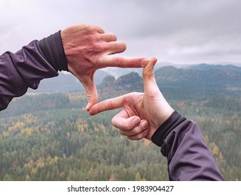 Hands Make Viewfinder From Fingers. Wonderful Mountains And Sunrise Natural Background. 