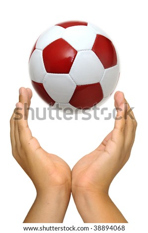 Hands making a cup and a soccer ball isolated in white