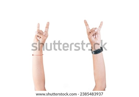 Hands making horns gesture isolated. Hands making rocknroll gesture