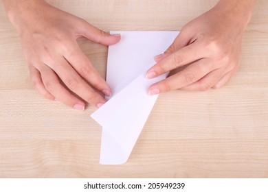 Hands Making Origami Figure, Close Up