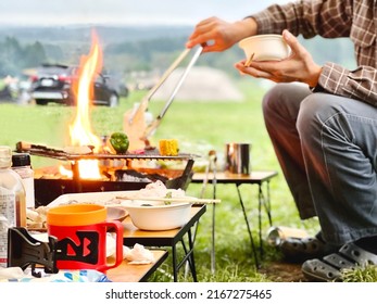 Hands Of A Man Barbecuing At A Solo Camp