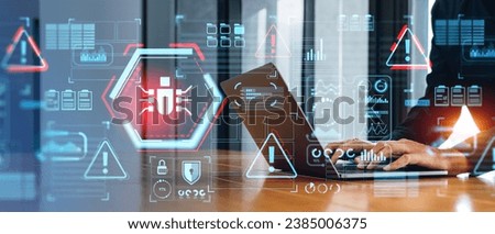 Hands of man developer using laptop in blurry office with double exposure of futuristic cybersecurity bug interface. Concept of data protection, cyberattack prevention and malware