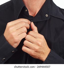 Hands A Man Fastened The Buttons On The Black Shirt Close Up