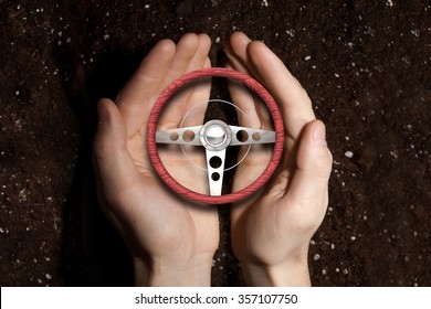 Hands Of Man Holding With Care Car Steering Wheel