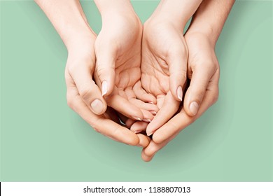 Hands of man and woman holding together - Shutterstock ID 1188807013