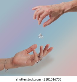 Hands man   woman and rings colored gradient background 