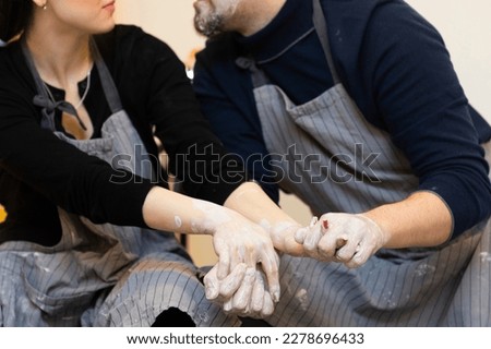 Similar – Caregiver checking blood pressure to a senior woman