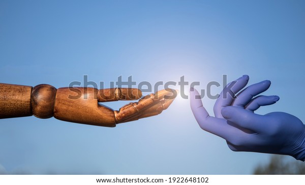 Hands in medical gloves. Hands concept. Help.\
Sky background. Hope. Sensual.\
