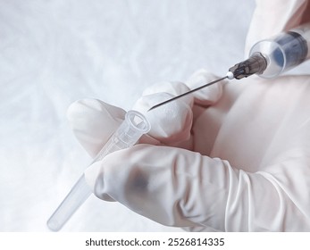 Hands in medical gloves remove cap from syringe needle. Opening syringe. Routine vaccinations for children concept. Vaccination. Sterile medical items. Open syringe needle for injection. Antibiotics. - Powered by Shutterstock