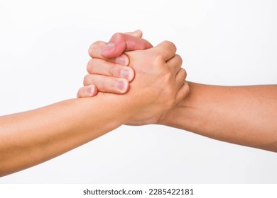 Hands of men and women shaking hands. Two people holding hands on white background. That can mean helping, caring, protecting, loving, caring and world peace concept.