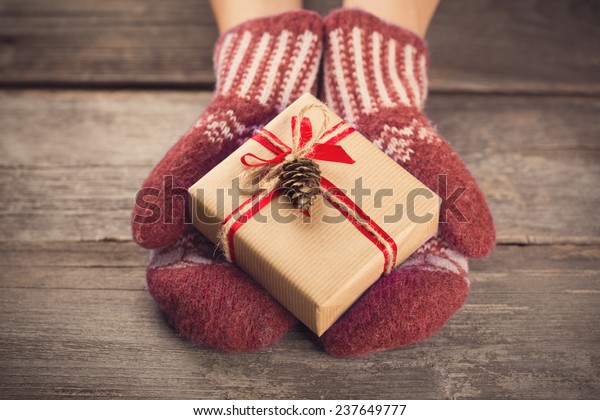 Hands Mittens Holding Gift Box Stock Photo (Edit Now) 237649777