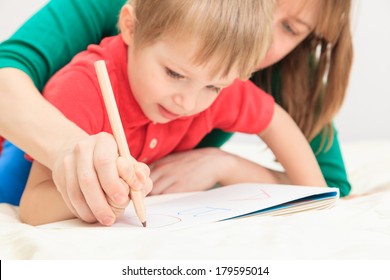 Hands Of Mother And Child Writing Letters, Early Education