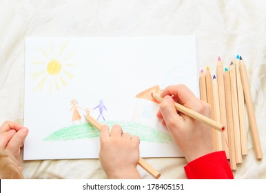 hands mother   son drawing family  family concept