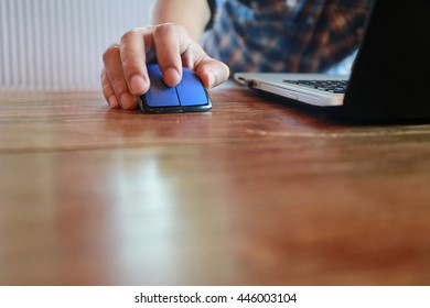Hands multitasking man working on laptop connecting wifi internet, businessman hand busy using laptop at office desk, finger typing on keyboard computer sitting at wooden table,hardworking life