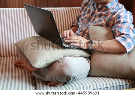 Hands multitasking man working on laptop connecting wifi internet, businessman hand busy using laptop at office desk, finger typing on keyboard computer sitting at wooden table,freelance life