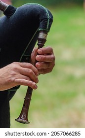 Hands Of A Musician Playing A Bagpipe From Galicia, Spain.