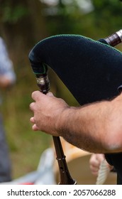 Hands Of A Musician Playing A Bagpipe From Galicia, Spain.