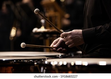 Hands Of A Musician Playing The Timpani In The Orchestra Close Up