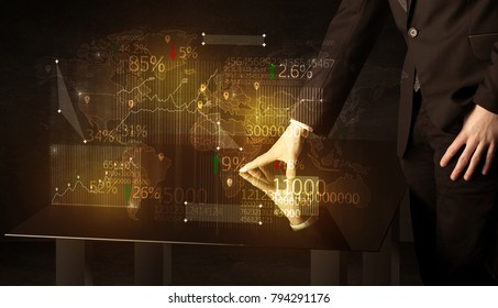 Hands navigate on high tech smart table with business icons and symbols