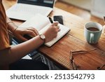 Hands, notebook and writing with notes for project, blog or article in home office. Journalist, thinking and diary for remote work, planning or research for copywriting or freelance career in house