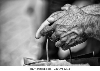 Hands of old man who had worked hardly in his life farmer
