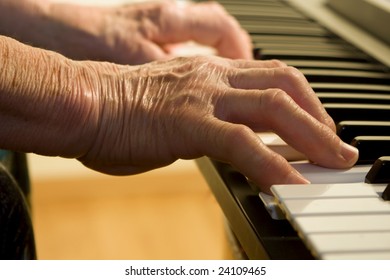 Hands Of Old Piano Player